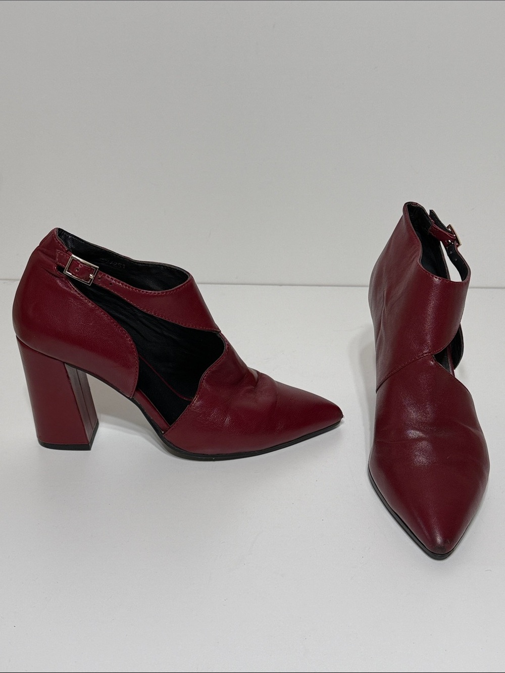 Bruno Premi LeatherBurgundy Pointed Ankle Booties with Asymmetric Cut